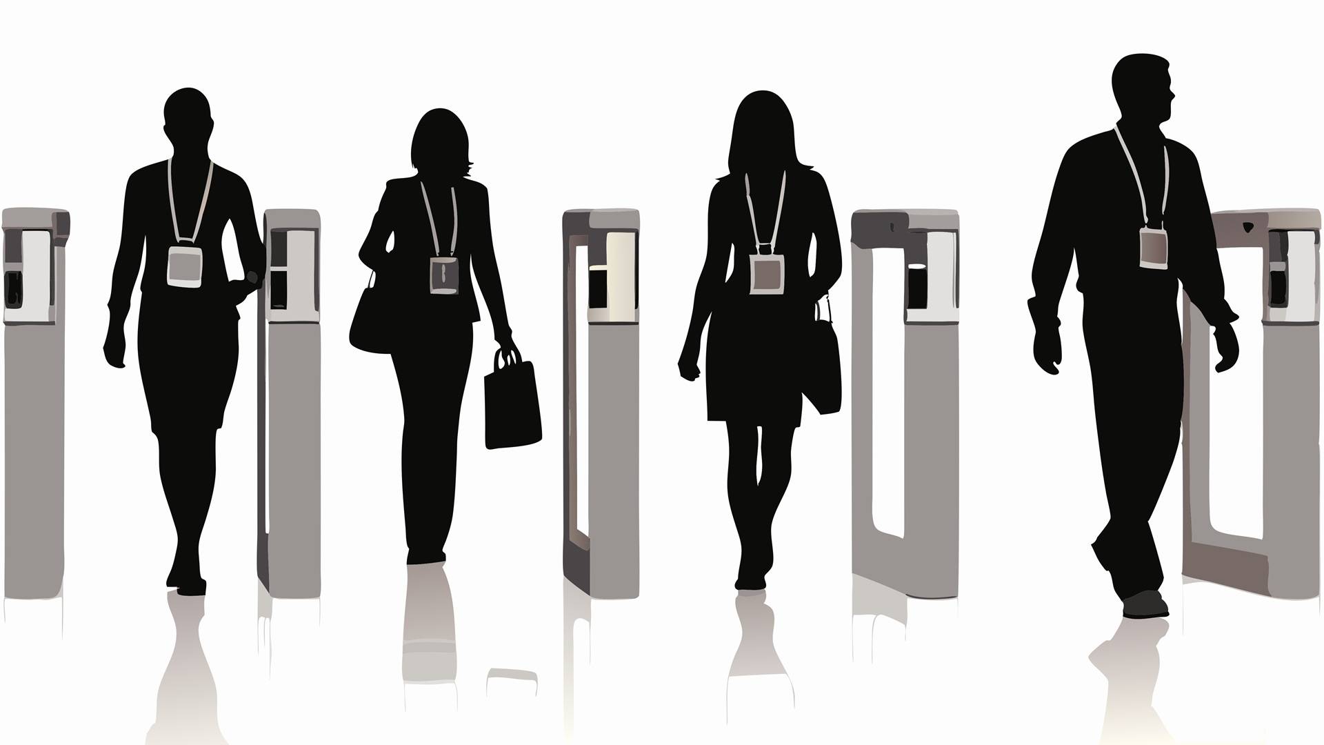 Personen gehen durch Zugangssysteme im Gebäude | Absperrpfosten